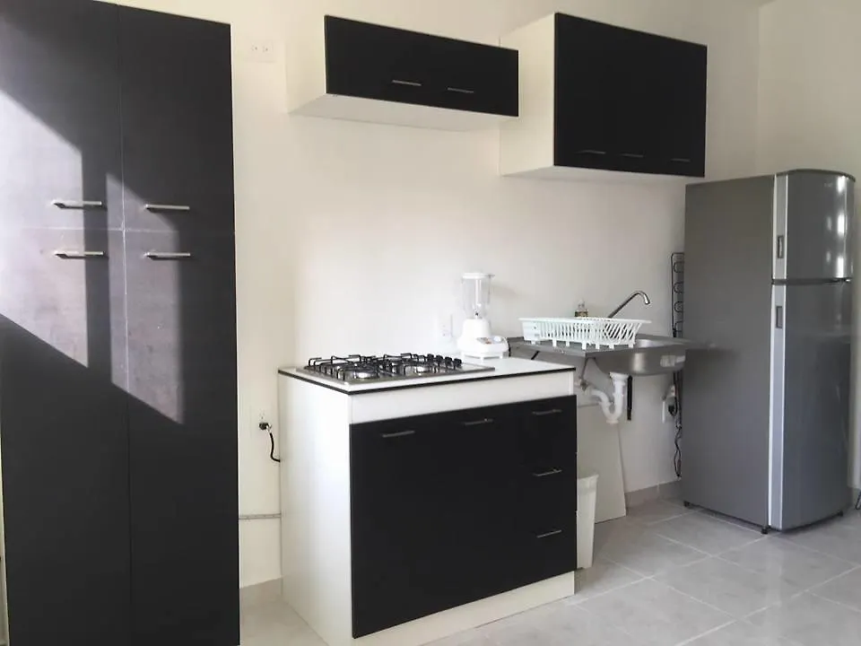 فندق بويرتو موريلوسفي  Casa Palma Real J&B بيت للعطل